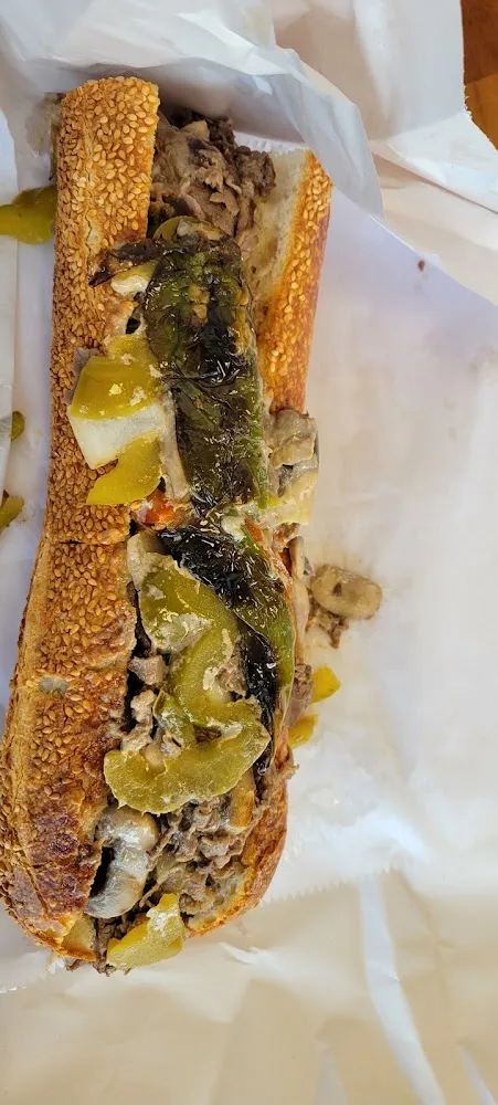 Cheesesteak with Long Hots Sweet Peppers Fried Onions and Mushrooms